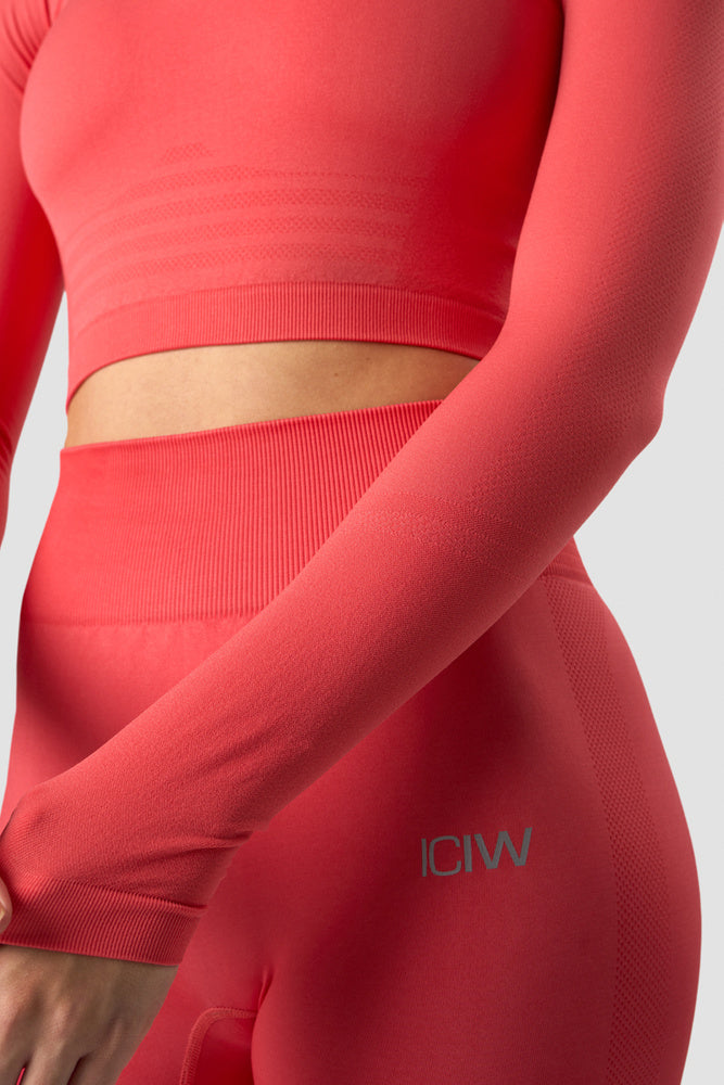 define cropped 1/4 zip coral