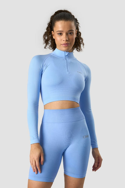 define cropped 1/4 zip daisy blue