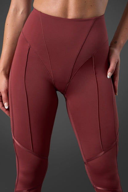 reboot tights brick red